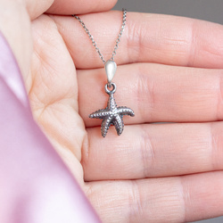 Srebrny charms- rozgwiazda